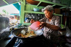 Meet the Local Expert Grandma or Amah cooking Pad Thai
